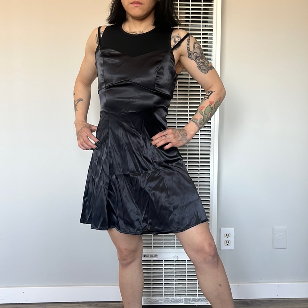 A line neverworn!! black satin dress with a bow tie in the back